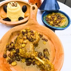 Tajine de cuisses de canard confites aux raisins secs